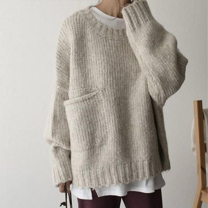 Übergroßer beiger Pullover mit Taschenfront